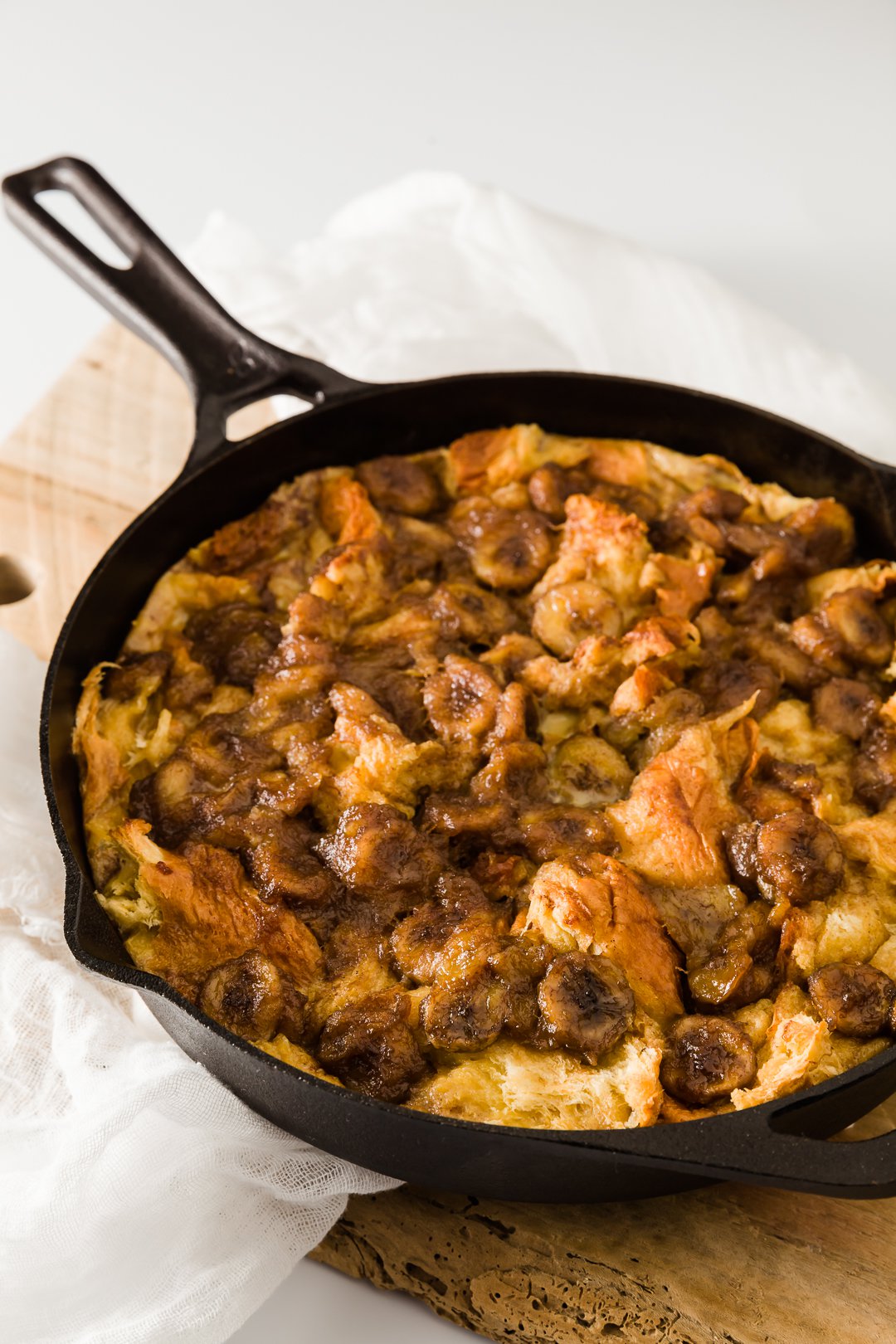 Bananas Foster French toast in a cast iron skillet, right out of the oven