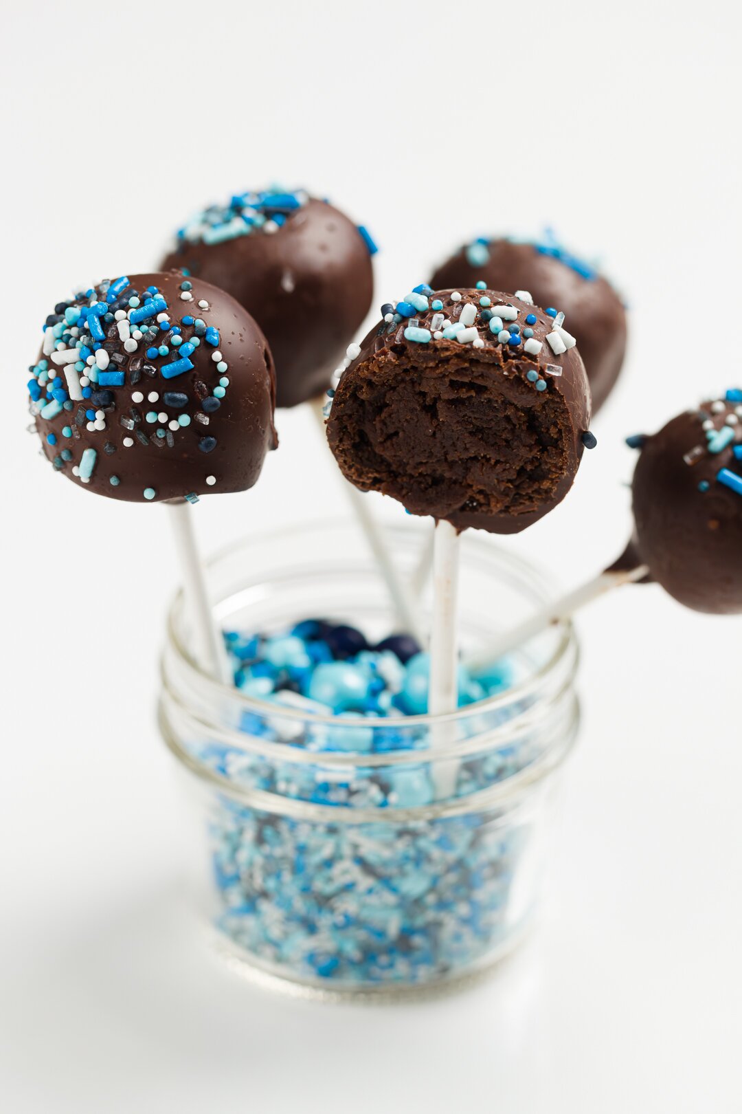 cake pops on display with one split open