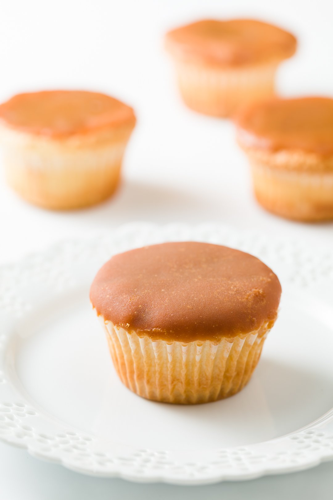 Hard and smooth caramel icing on a cupcake