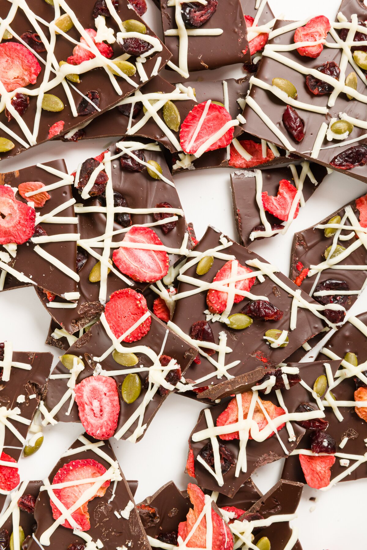 overhead view of closeup chocolate bark on a white countertop