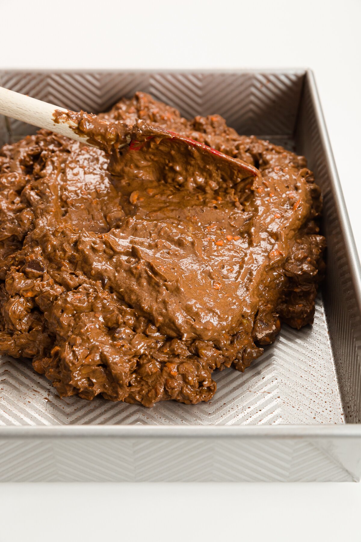 Spreading batter into metal baking pan