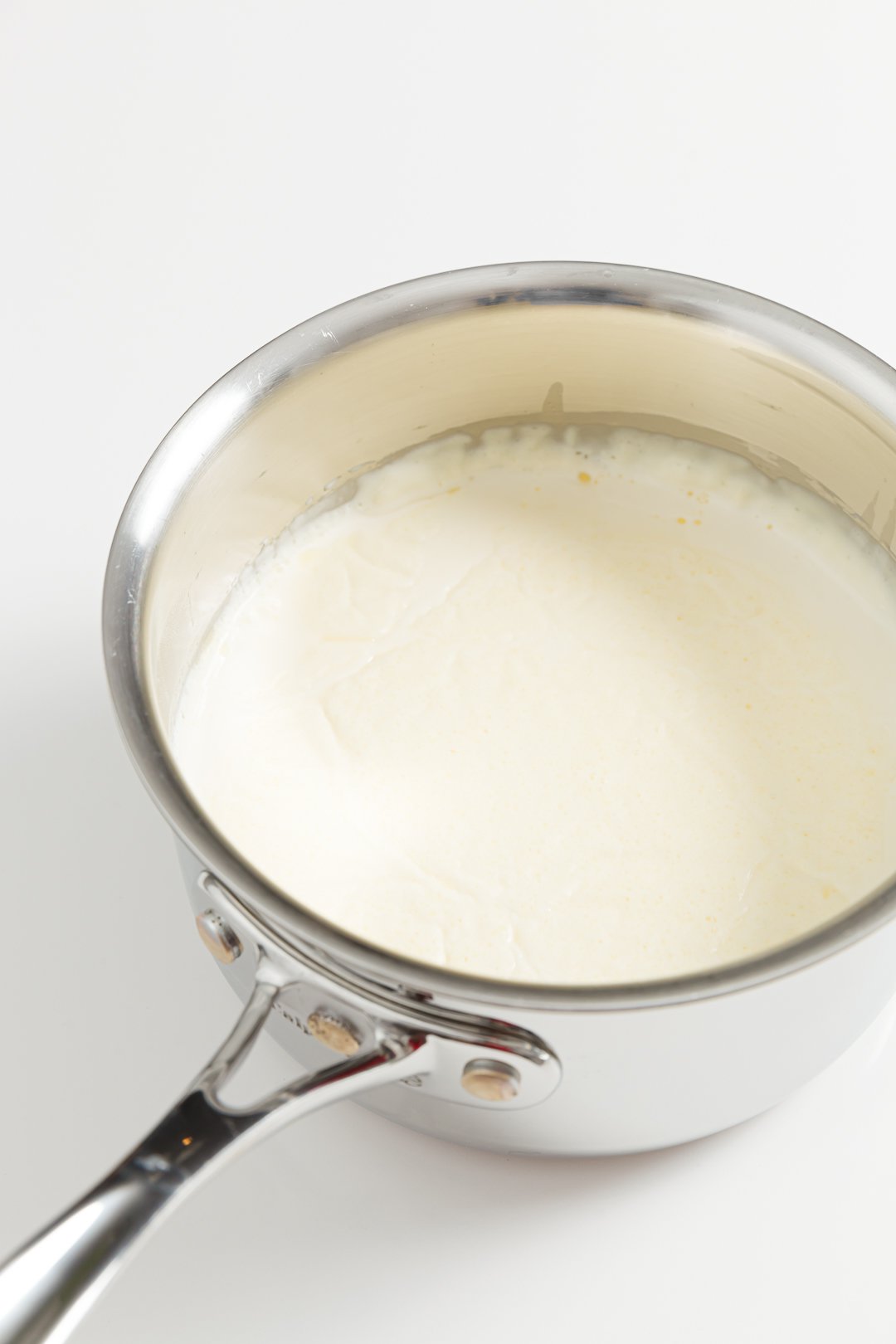Cooked clotted cream at the top of a pot