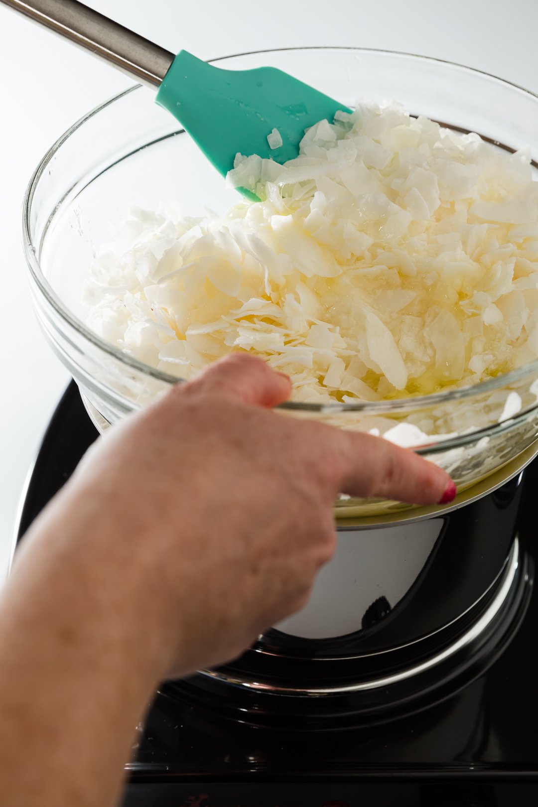 Making coconut macaroons over a double boiler