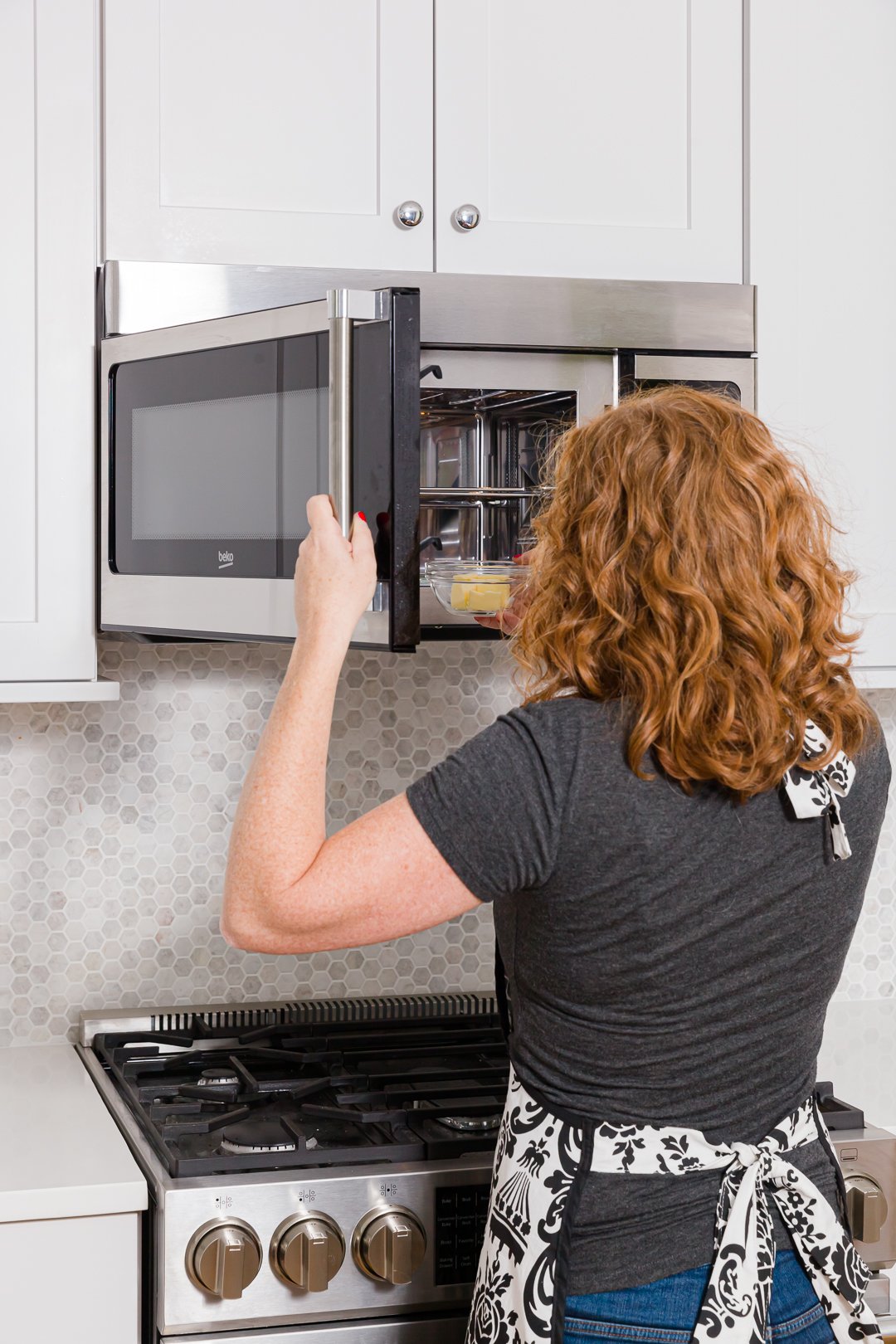 pulling melted butter from the microwave