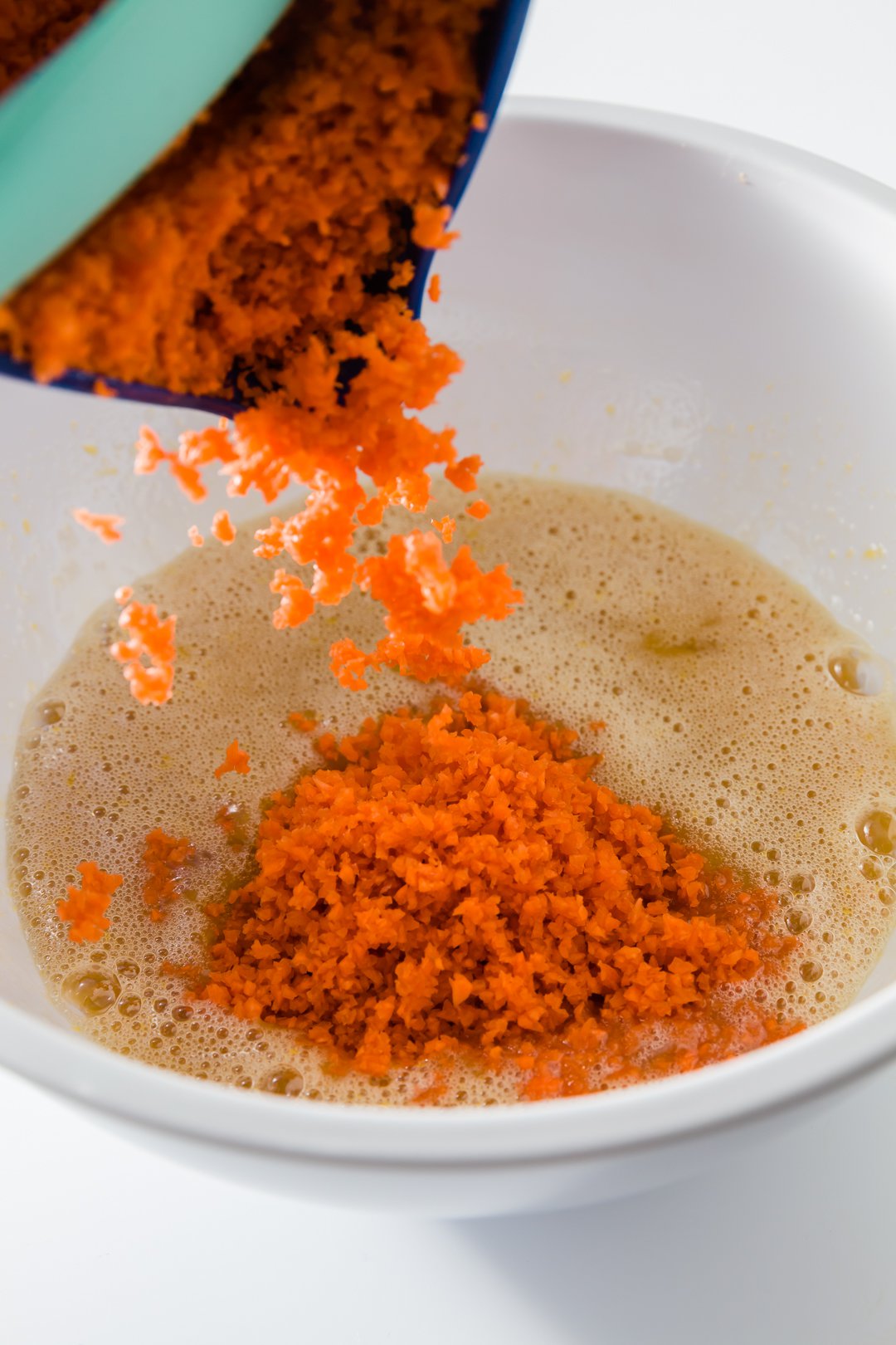 Adding carrots to healthy carrot cake