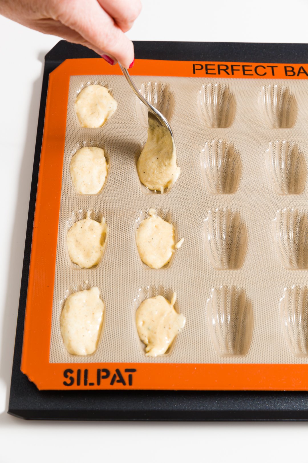 Filling mini madeleine molds