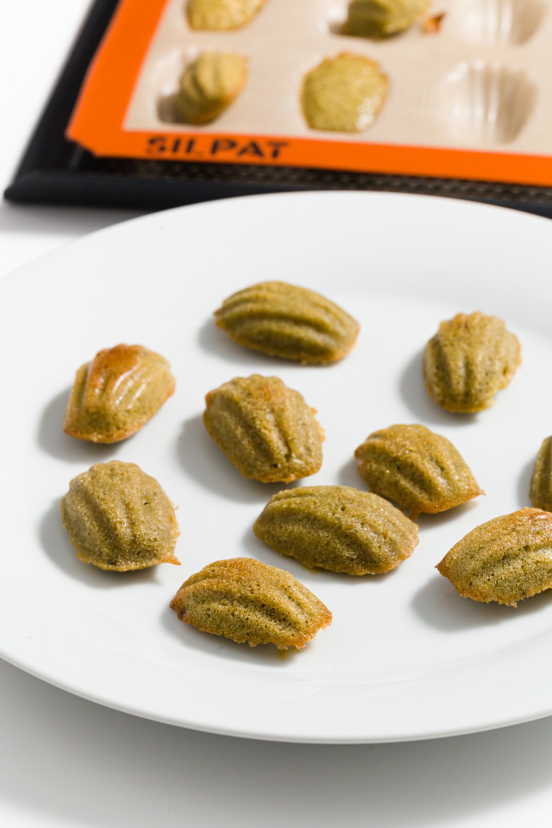A plate of matcha madeleines