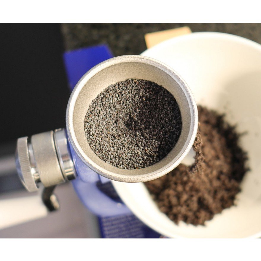 poppies going through a poppy grinder