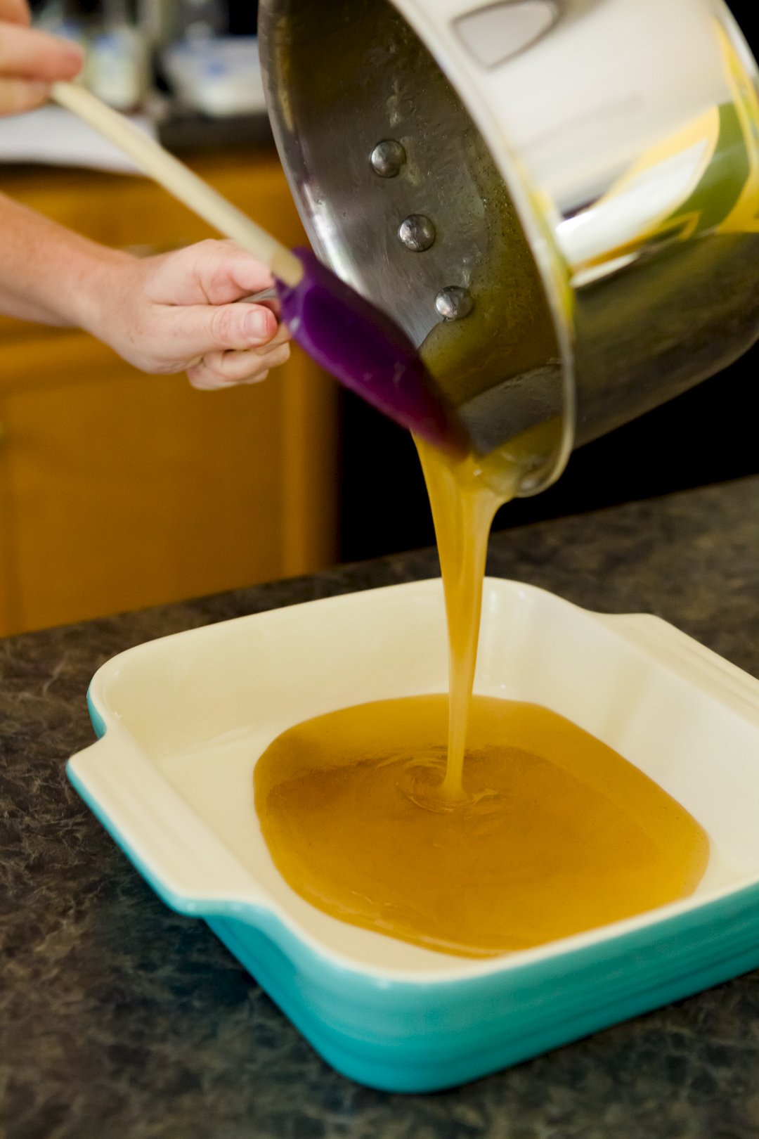 Pouring taffy into a baking dish