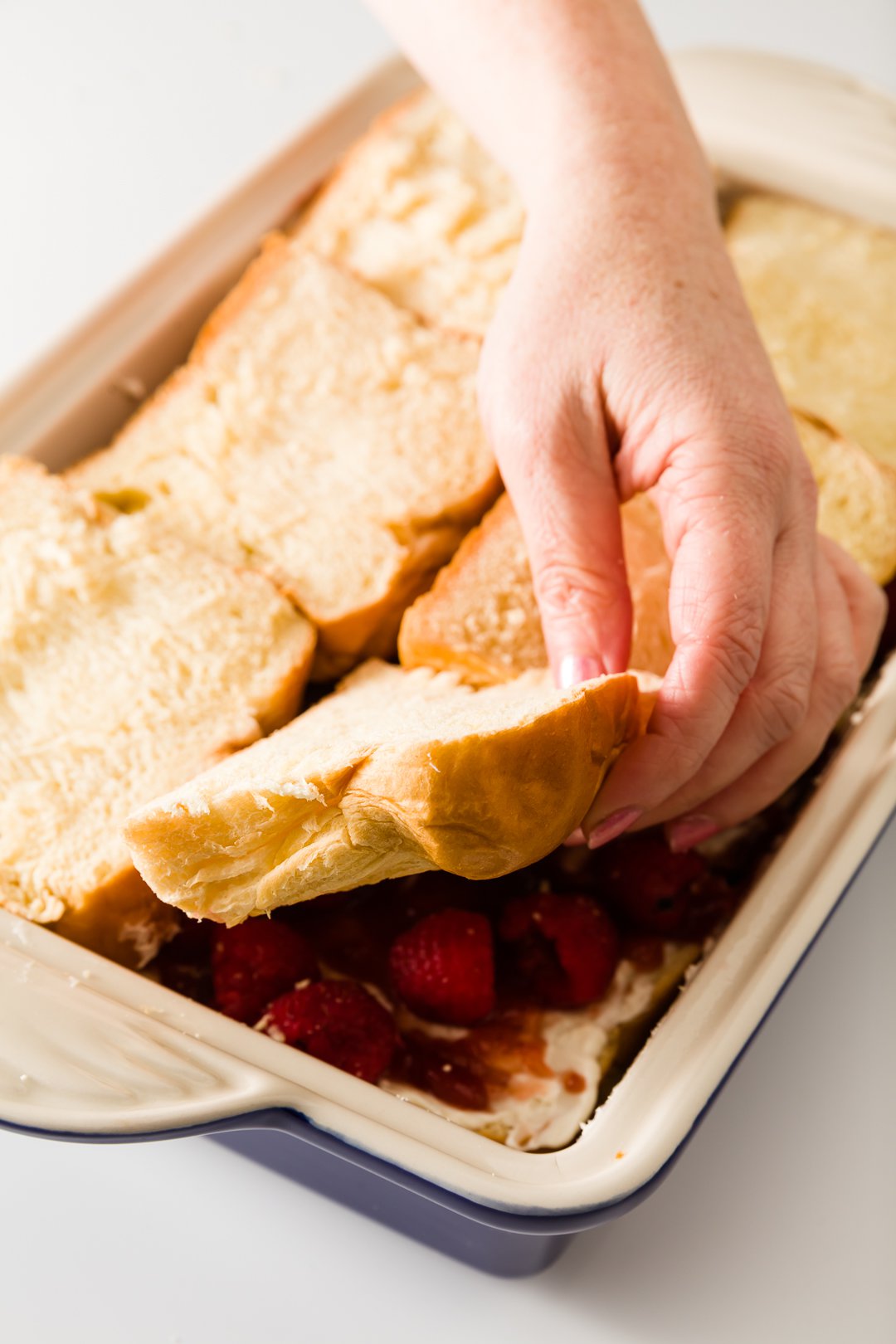 Place a piece of bread over fillings in stuffed french toast