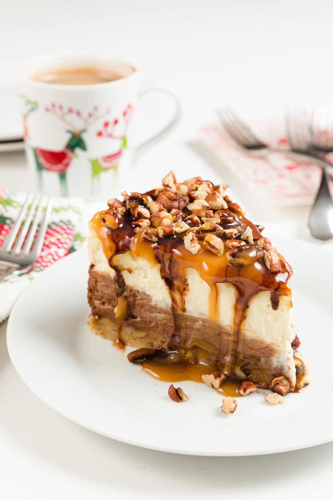 Slice of turtle cheesecake on a plate